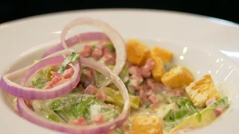 People eating Caesar salad Video stock 101004785