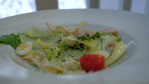 People eating Caesar salad at restaurant Video stock 89030299