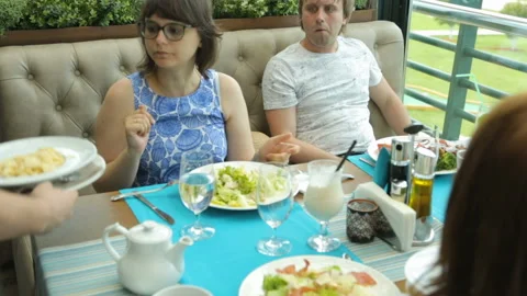 People eating in cafe 库存影片 96094588