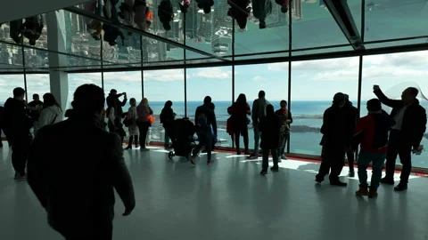 People eating in cafe, looking at view, CN Tower interior, wide angle Stock Footage 192035424