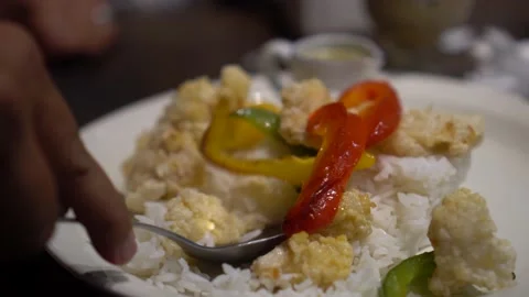 People eating crispy fried chicken  using spoon Stock Footage 221295443