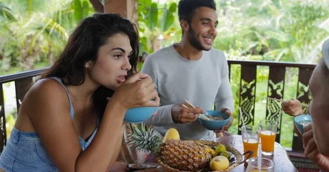 People Eating Delicious Noodles Asian Food, Friends Group Sit At Table On Stock Footage