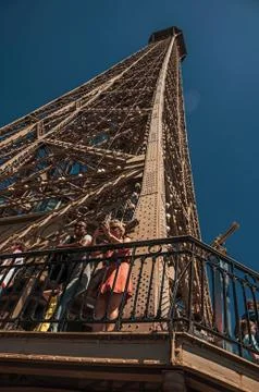 People on Eiffel Tower with blue sky in Paris 写真素材