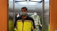 People On Elevator Wearing Surgical Masks During Covid-19 Coronavirus Pandemic Stock Footage