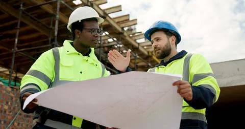 People, engineer and talking at site with document, blueprint and planning .. Foto stock