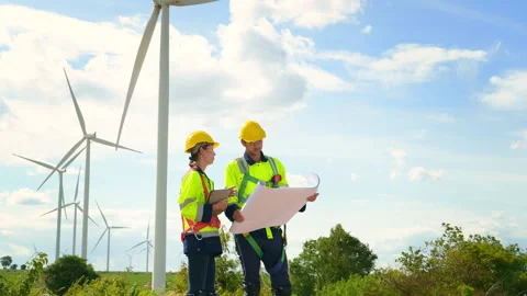 People engineer are wearing a protective helmet on head, using tablet Analy.. Stock Footage 269099729