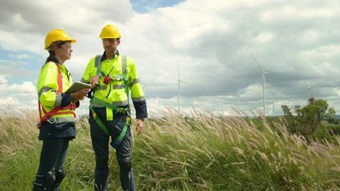 People engineer are wearing a protective helmet on head, using tablet Analy.. Stock Footage 269099847