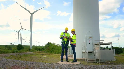 People engineer are wearing a protective helmet on head, using tablet Analy.. Stock Footage 269099852