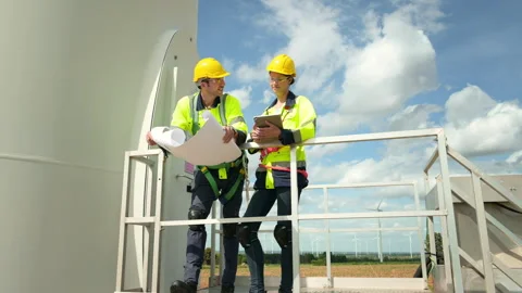 People engineer are wearing a protective helmet on head, using tablet Analy.. Stock Footage 269100005
