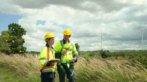 People engineer are wearing a protective helmet on head, using tablet Analy.. Stock Footage 269100067