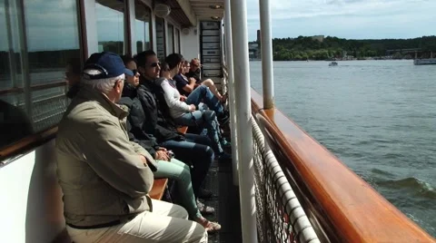 People enjoy boat excursion in the harbor of Stockholm, Sweden. Stock Footage 61166588