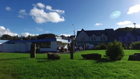 People enjoy coffee with Landscape marina view - Crosshaven, Ireland Stock Footage