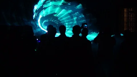 People Enjoying 3D Laser light show Light Effects in an event. Stock Footage 112250375