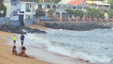 People Enjoying Beach Running Stock Footage 250104566