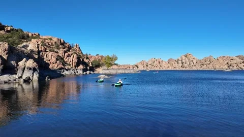 People enjoying kayaking on Watson Lake. Stock Footage 338024367