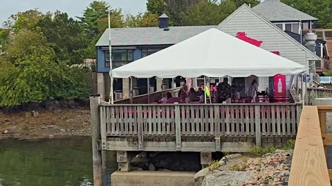 People enjoying lunch at the Chowder House in Cape Porpoise, Maine Stock Footage 343903055