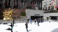 People Enjoying Rockefeller Center Ice Skating Rink Cold Winter New York City HD Footage