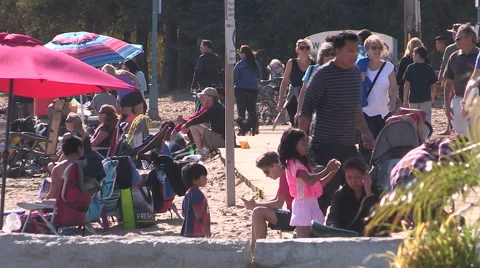 People enjoying Toronto eastern beaches on warm autumn day Stock Footage 55839359