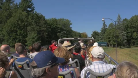 People enjoying view on double decker tourist bus. Video stock 207514384