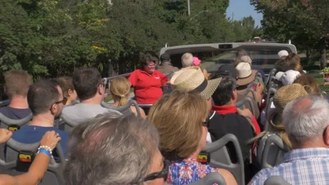 People enjoying view on double decker tourist bus. Видео 207516990
