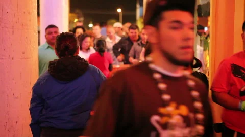 People enter a crowded corridor through a checkpoint Stock Footage 241349632