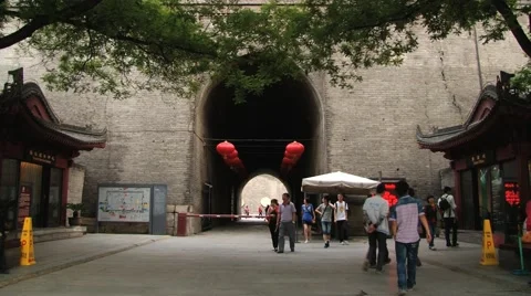 People enter to the gate of the Great Wall in Xian, China. Stock Footage 64947528