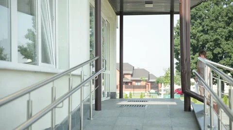 People  entering into a building Stock Footage 59590935