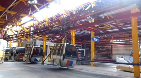 People entering Cable cart loading deck in Engelberg Switzerland Stock Footage 66054959