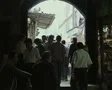 People entering indoor market SD Footage