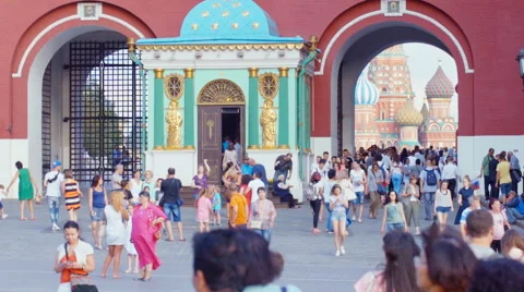 People entering the Red Square through the arch Stock Footage 64814179