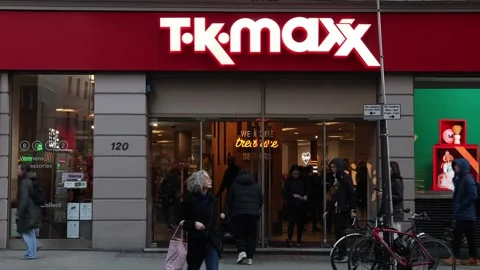 People entering Tk Maxx store with clothes, accessories and home decor. Stock Footage 326546873