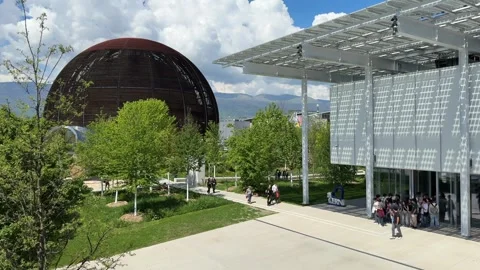 People Entering Visitor Center at CERN in Switzerland - Sunny Day Stock Footage 321674076