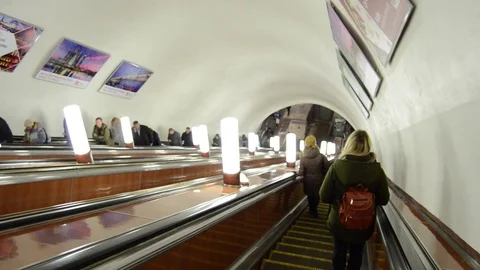 People on the escalator in the subway down Stock Footage