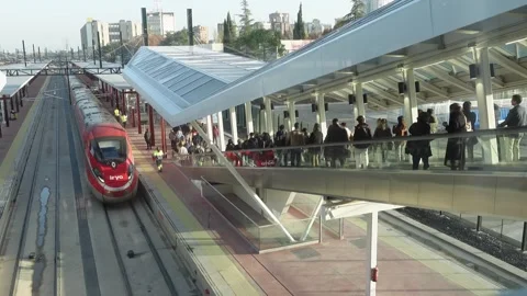 People on an escalator to the train platform Stock Footage 294821637