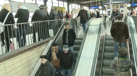People on escalator in train station Stock Footage 1089304