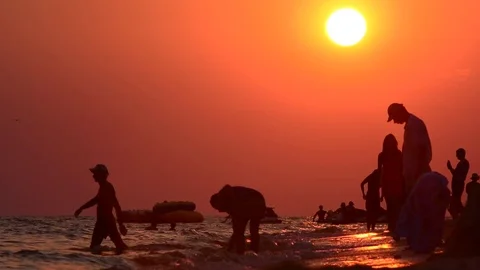 People at the evening seaside Stock Footage 75954742