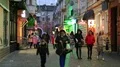 People on the evening street in old town in Ternopil city, Ukraine HD Footage