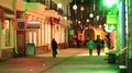 People on the evening street in old town in Ternopil city, Ukraine HD Footage