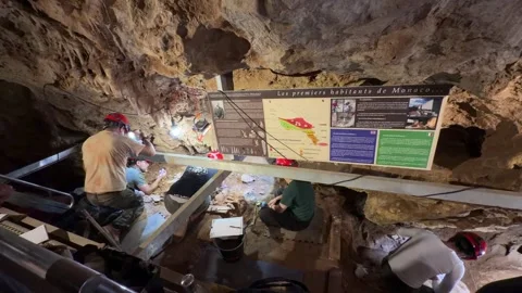 People Excavating Artifacts from Limestone Jardin Exotique Monaco Stock Footage 346792292