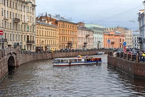 People in excursion boat ride to The Second Winter Bridge. St Petersburg. Rus Stock Photos