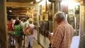 People at excursion inside Radomysl Castle, the museum of Ukrainian home icons HD Footage