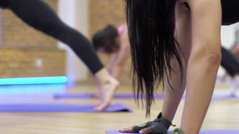 People exercise at a gym by using bungee training Vídeos de archivo 73484352