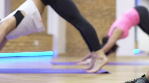People exercise at a gym by using bungee training Stockbeeldmateriaal 73484427