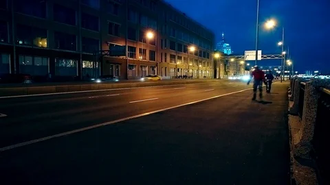People exercise at night on a bicycle Stock Footage 85246872