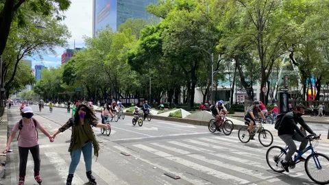 People exercise in Paseo de La Reforma avenue, Mexico City 4K Stock Footage 159382694