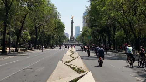 People exercise in Paseo de la Reforma avenue, Mexico City, Mexico 4K Video stock 309331077