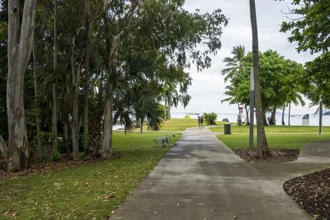 People Exercising Along The Beachfront Stock Photos