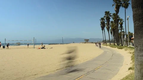 People Exercising along the Venice Beach Bike Path in Los Angeles. Video stock 80822449