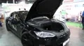 People at exhibition of electric cars. Tesla electromobile HD Footage