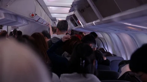 People Exit Airplane (1) Stock Footage 89492132